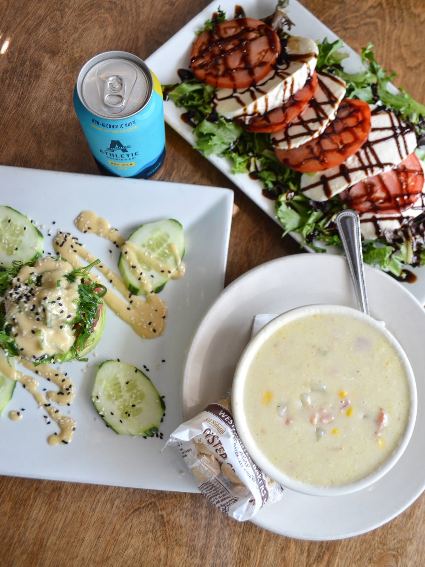 Fresh caprese salad, tuna tartare, and New England clam chowder
